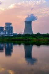 At dusk, the thermal power plants , tops of cooling towers of atomic power plant