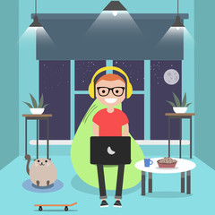 Young character sitting on bean bag with laptop.Night room.Gamer.Flat cartoon design