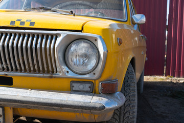 yellow taxi car closeup. chrome elements of the car body 60-70 years