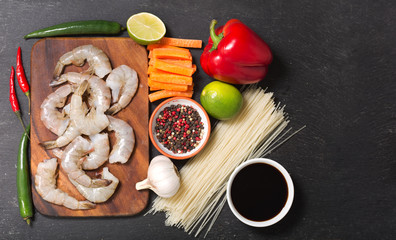 Asian food. Ingredients for cooking stir fried noodles with shrimps, top view