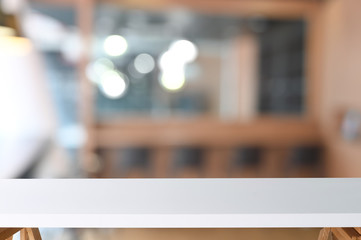 White table on blur office desk.