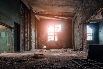 Fototapeta na wymiar Abandoned industrial building interior