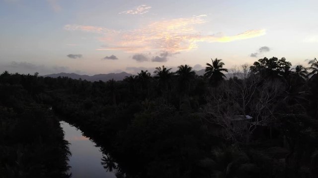 Fly over river at sunrise, San Vincente, Philippines