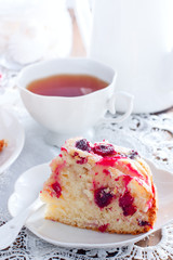 Cranberry pie and apples on a wooden table, selective focus