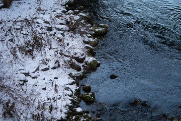 River bank in Snow of Winter 