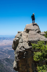 Sierra Vista/USA - 18 May 2013: Hiker on a rock