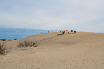 Hang gliding school on the dunes of Jockey's Ridge State Park in the Outer Banks of North Carolina