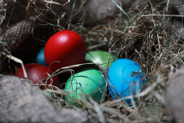 Easter painted eggs on burlap