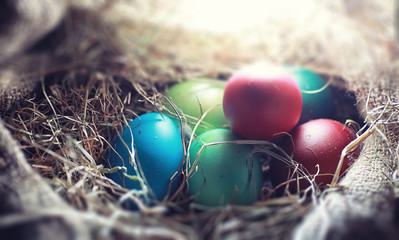 Easter painted eggs on burlap