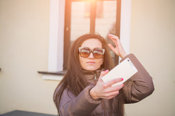 Hipster stunning woman making selfie