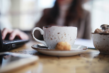 Girl eating coffee cakes