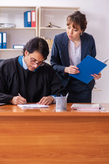 Two lawyers working in the office
