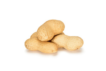 Peanuts. Four real whole nuts isolated on white background. Peanut macro close up. Full depth of field.