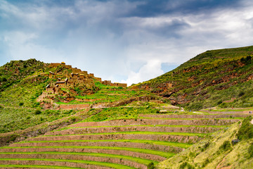 Fototapeta premium Ruins of Inca Citadel on the mountain at the Sacres Valley of Inca in Pisac