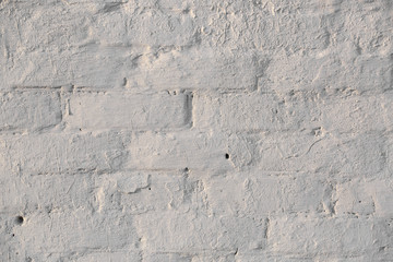 Old textured brick wall with natural defects. Scratches, cracks, crevices, chips, dust, roughness. Can be used as background for design or poster.