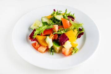 vegetable salad on the white plate