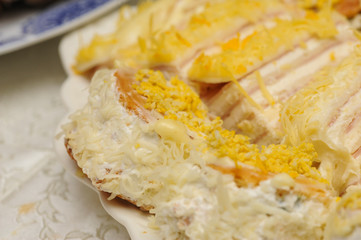 .A deliciously salty appetizer with cheese served on a plate. Tasty meal served on a plate.