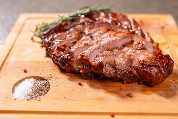 Food, delicious, horse meat and craft concept - serving of grilled steak
