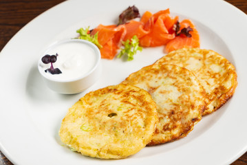 potato pancakes with smoked salmon and sour cream