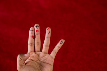 Red background and fingers and cute smile Art concept