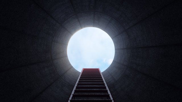 Climbing the stairs of a dark well. Inside the hole.