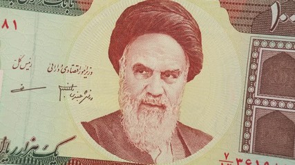 Iran rial notes rotating. Iranian currency, money. 4K stock video footage