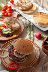 Two burger, vegan burger and beef patty burger