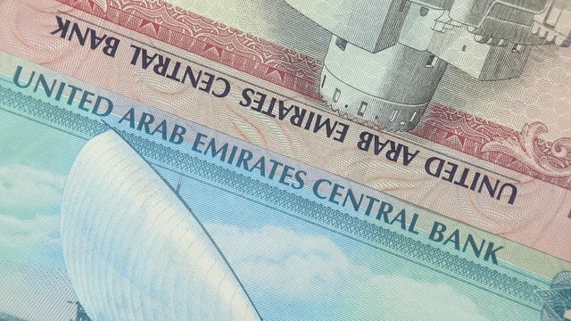 UAE dirham notes rotating. United Arab Emirates currency, money. 4K stock video footage