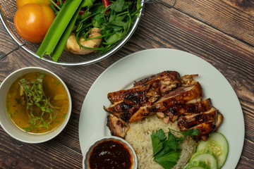 set of chicken rice on wooden background