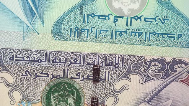 UAE dirham notes rotating. United Arab Emirates currency, money. 4K stock video footage
