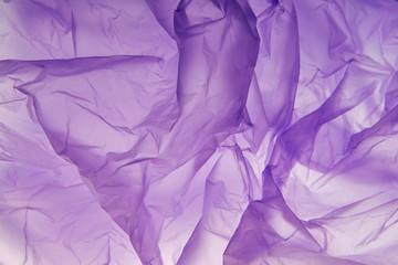 Plastic bag background. Abstract colored stains background. Lilac, purple, violet, spots
