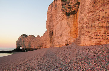 White rocks in Normandy. Photo of the beach near the town of Etretat in France.