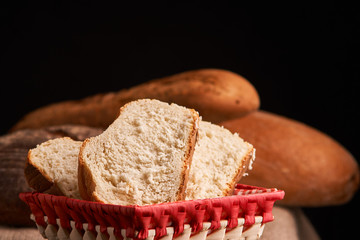 breads and baguette concept of teasty home food close up on table