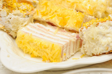 .A deliciously salty appetizer with cheese served on a plate. Tasty meal served on a plate.