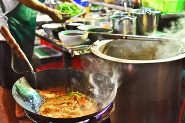 Fotobehang Chinese street food sold in Bangkok Chinatown © monticellllo