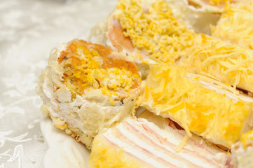 .A deliciously salty appetizer with cheese served on a plate. Tasty meal served on a plate.