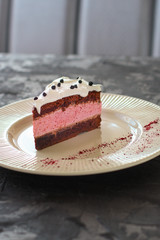 cake mousse berry, chocolate biscuit - dessert is sweet and tasty. piece of cake. food background. top