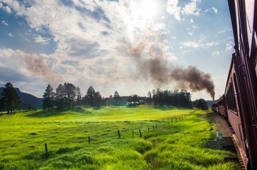 1880 Steam Train moving through a country side in Black Hills in south Dakato 