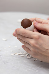 Traditional Finnish Easter chocolate egg in a natural egg shell