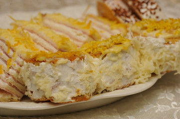 .A deliciously salty appetizer with cheese served on a plate. Tasty meal served on a plate.