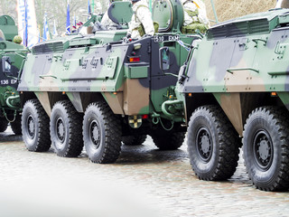 Militars Marching through the streets.