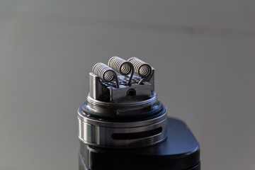 Three coils on rebuildable vape atomizer