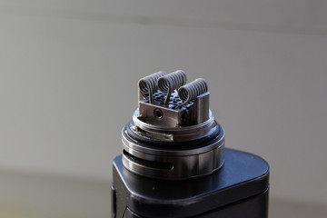 Three coils on rebuildable vape atomizer