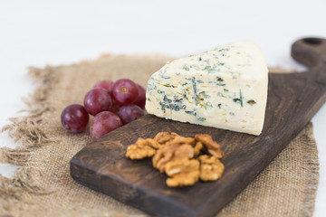 Blue cheese or brie with grapes and nuts