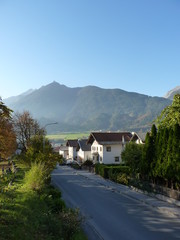 Isolated city caught in between the mountain chains before the sunset
