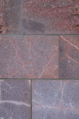 Background: Red Porphyry stone in tiles