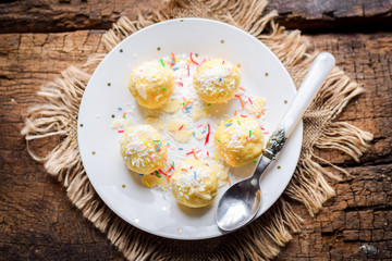 Cottage cheese balls in colored dressing.