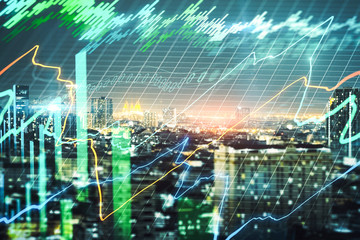 Abstract forex chart on city backdrop