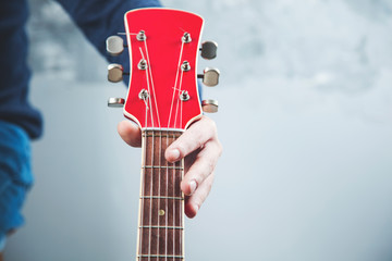 man hand guitar