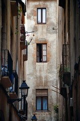 Fototapeta na wymiar Old buildings in Gothic Quarter in Barcelona